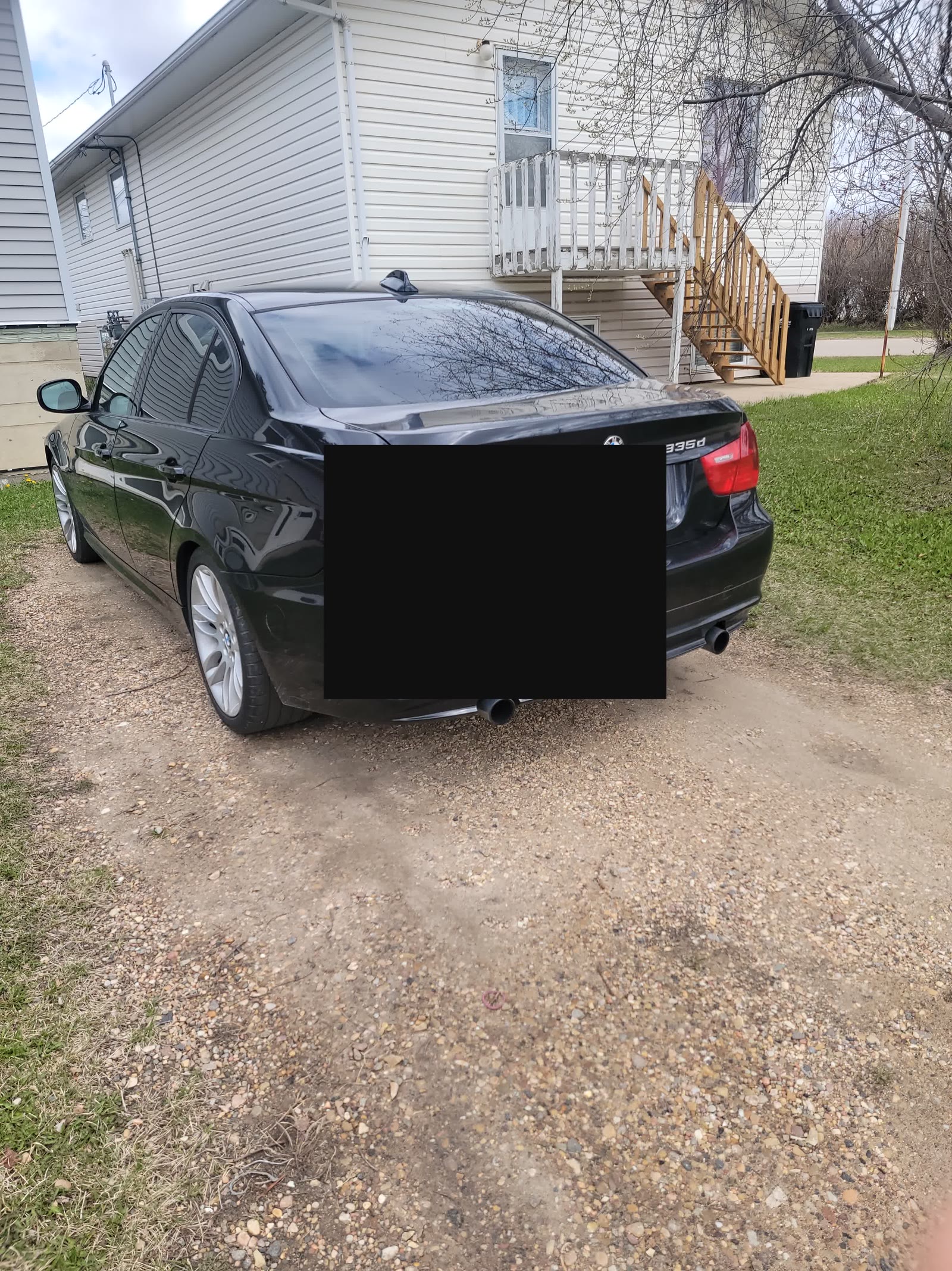 Betsy rear three-quarter — plate redacted
