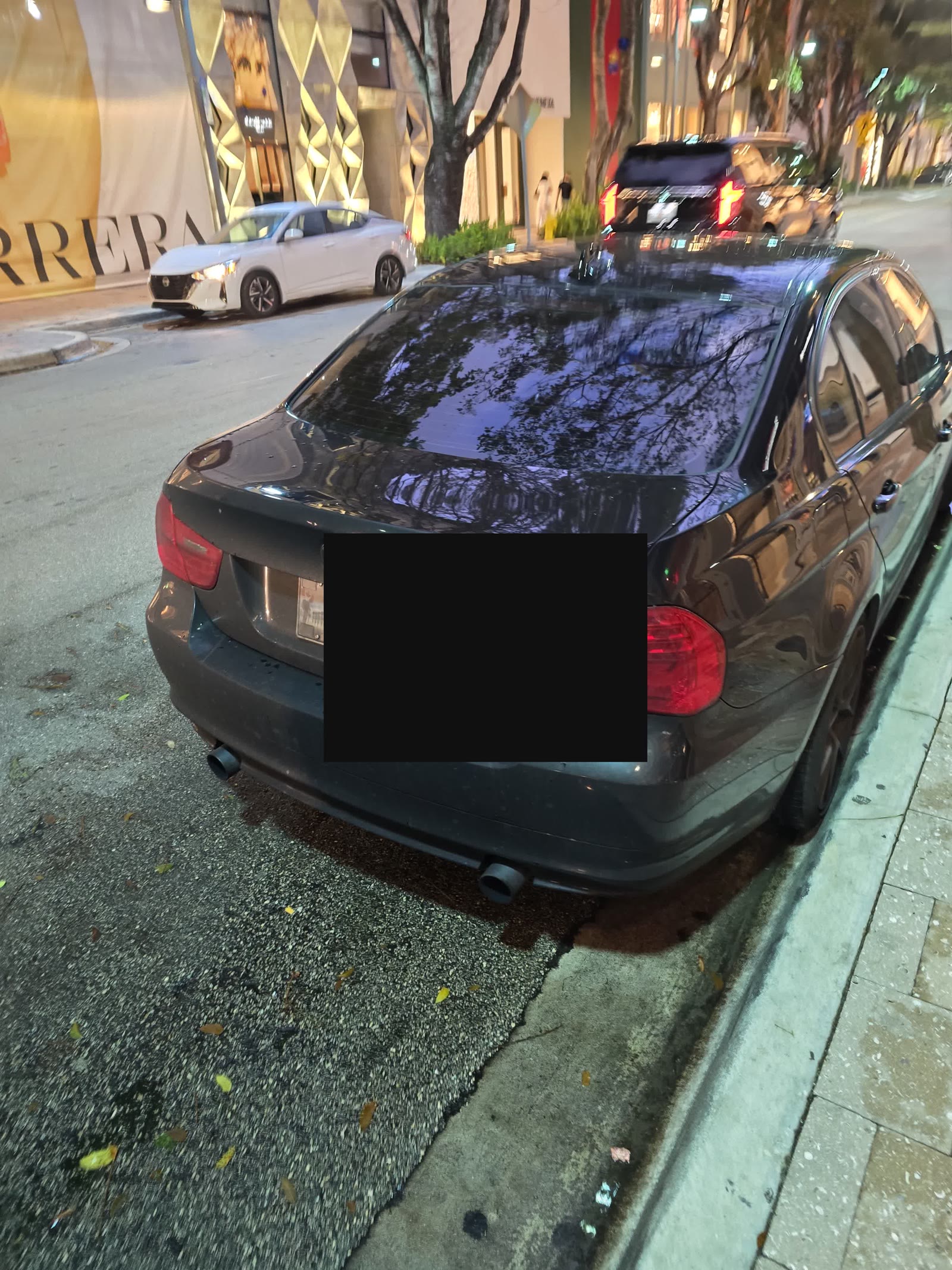 Betsy night street — plate redacted